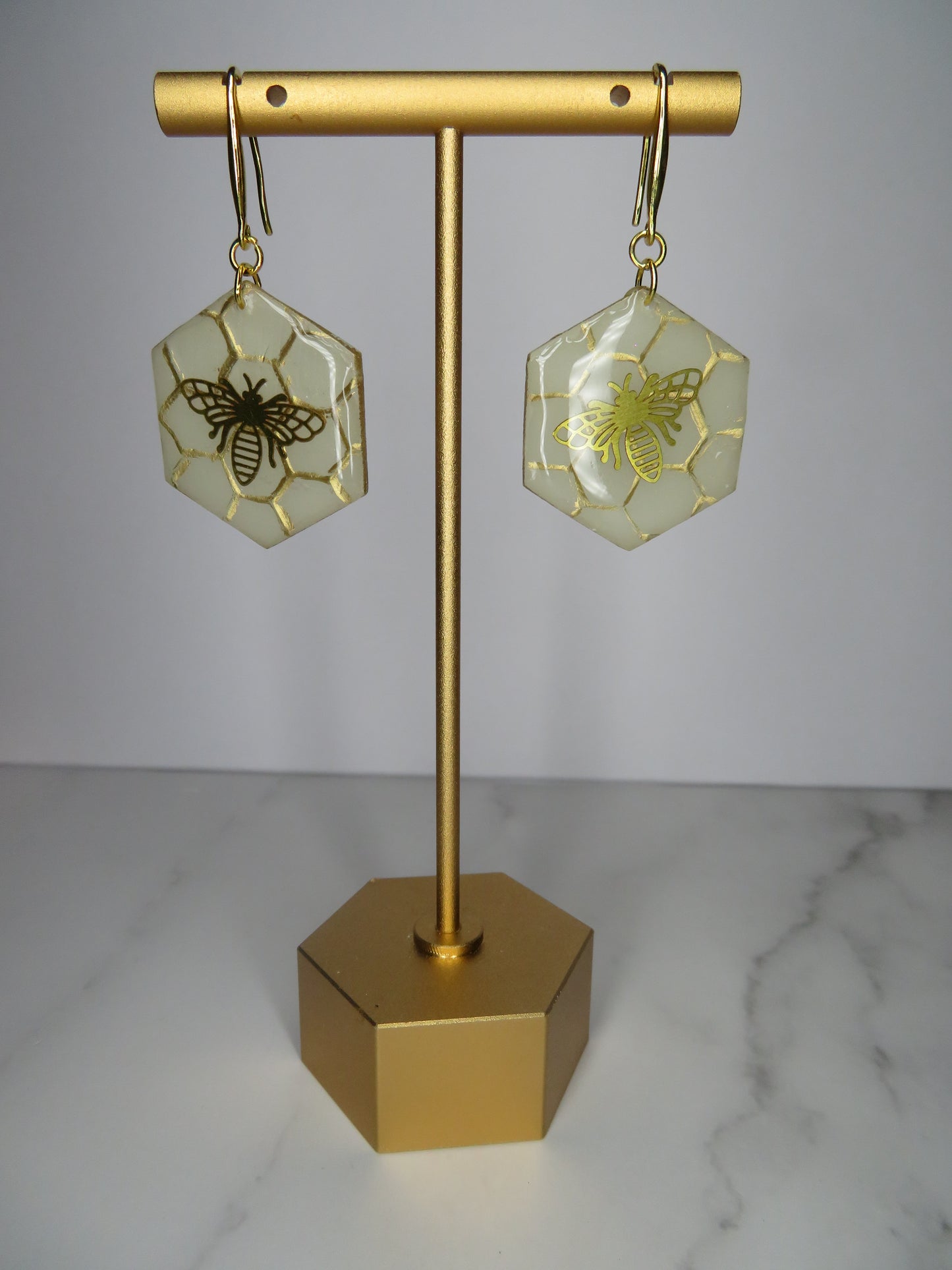 Brass bee on honeycomb earrings