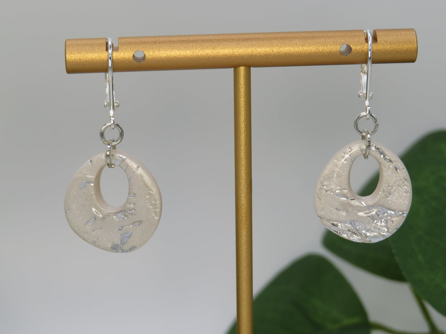 Silver on pearl finish earrings
