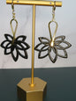 Flower double dangle earrings in black with gold sparkles