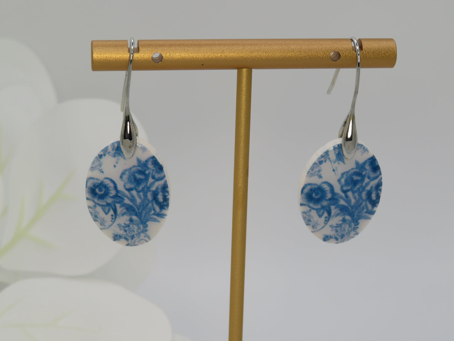 Blue and white floral dangle earrings